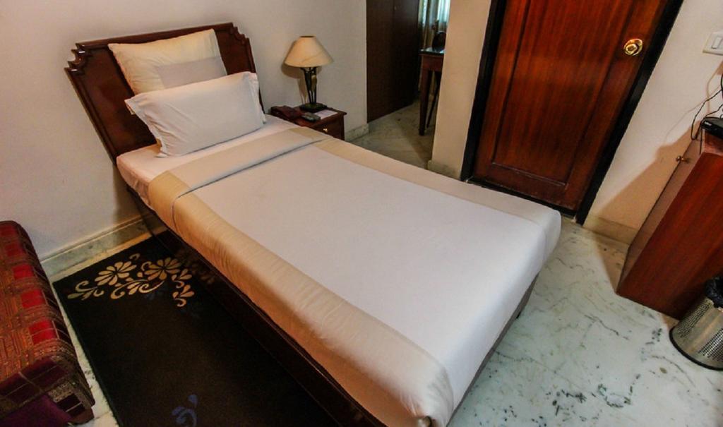 Hotel Pigeon International Bangalore Rum bild