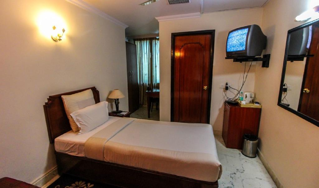 Hotel Pigeon International Bangalore Exteriör bild
