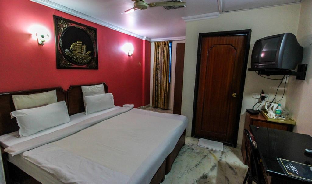 Hotel Pigeon International Bangalore Rum bild