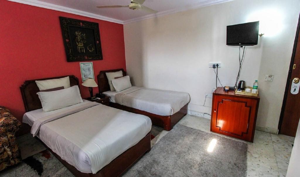 Hotel Pigeon International Bangalore Rum bild