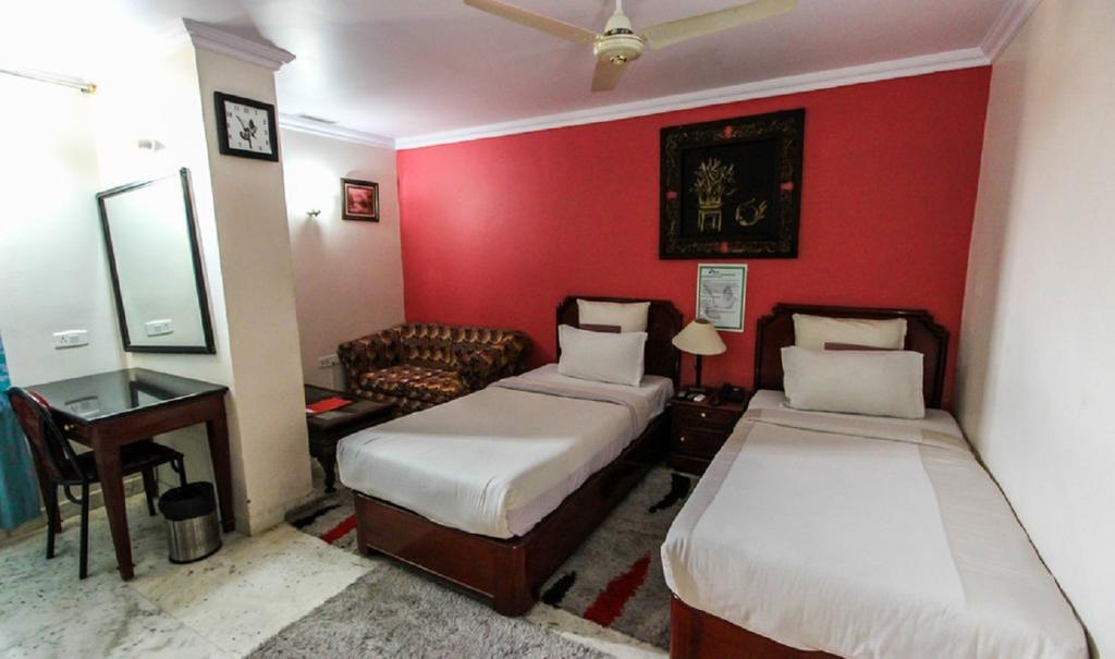 Hotel Pigeon International Bangalore Rum bild